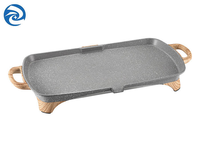Le griglie elettriche del grano di legno della pietra cuoce le padelle sulla piastra 1350W 220V
